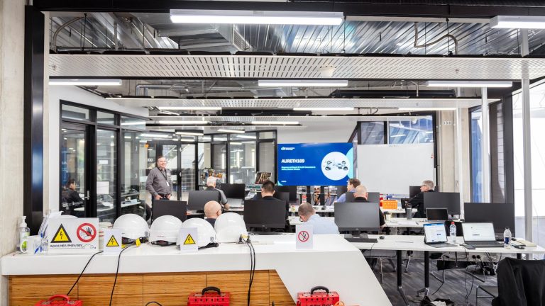 A classroom or training room setup where participants are attending an EV training session
