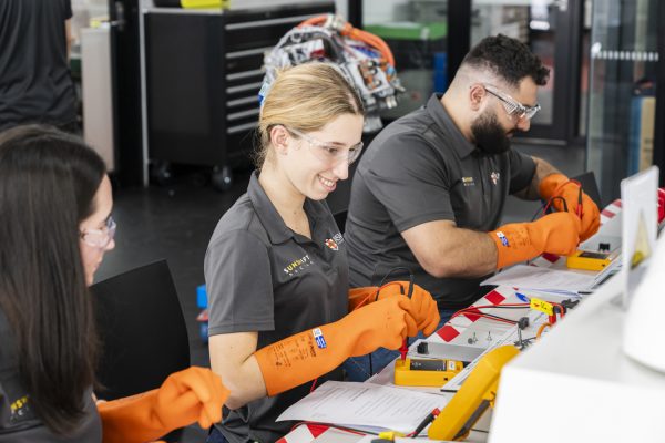Students from UNSW at Kangan Institute's Automotive Centre of Excellence training in EV and battery technology