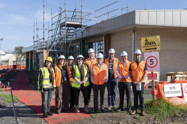 Group photo at the Hume Tech School construction