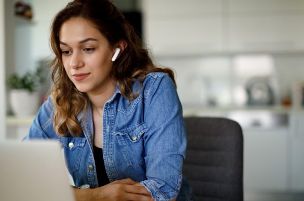 Image of a person using the laptop